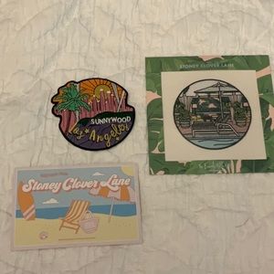 2 Stoney clover lane patches and a post card